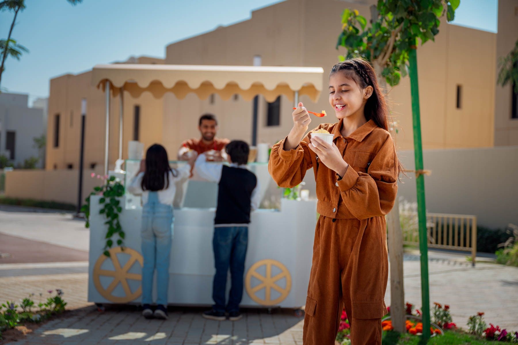 Modern community park with families enjoying the outdoors